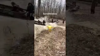 Country boys jumping a duck boat over land.