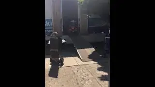 loading bike up on moving truck