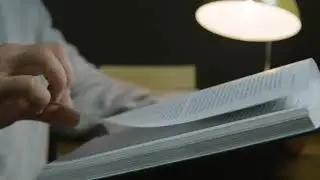 Man Reading Books on Table Library 2 / Free Footage