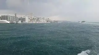 Storm on Bosphorus. Heavy rainfall engulfs Bosporus Strait in Istanbul