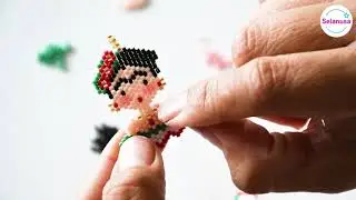 Dije Frida con chaquira delica miyuki