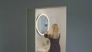 Loevschall Pisa Mirror - floating mirror in frame with light