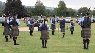 The Vale of Atholl Pipe Band playing Amazing Grace and Farewell to Nigg at Pitlochry, Scotland 2021