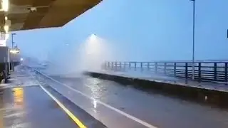 Waves batter railway line at Dawlish station as Storm Emma hits UK