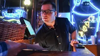 Joshua Bosman hosts trivia at Brown Jug