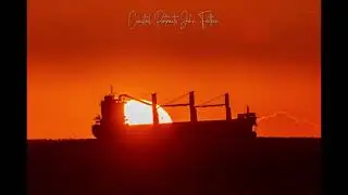 Sun Rising behind Cargo Vessel on the Port of Tyne Anchorage