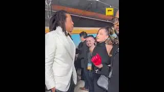 Jay-Z gives singer Maeta her flowers at 