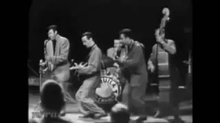 Chuck Flores's  TEQUILA.  Twice.  Chuck wrote & performed it.  He's the sax player.