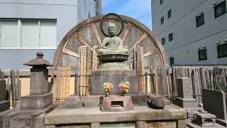 Walking into buddhist cemetery in tokyo