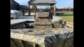 The LOWE&reg; Roughneck 1860 Center Console in Mossy Oak&reg; Shadowgrass Camo