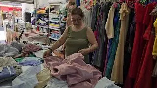 Went to my cousin store and buy clothes for the wedding,/ so excited to the mother of the bride .