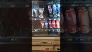 ME GETTING SOMETHING AT THE VENDING MACHINE GETTING A BLUE GATORADE HERE