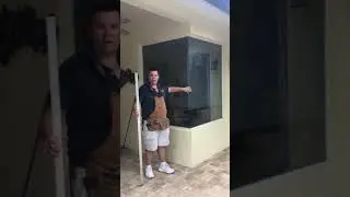 Installing Storm Stoppers on an Aquarium Window | Hurricane Window Protection