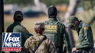 'Unbelievable' video shows border agents opening gate to migrants