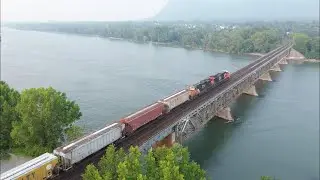 Nice Aerial 4K View! Long Freight Train CN 400 on Bridge at McMasterville, Quebec - Going Away View