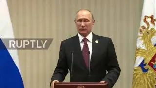 PUTIN discusses Trump Brexit and OPEC in Lima Peru
