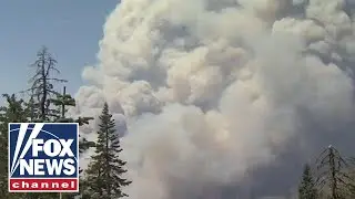 Fire officials airlift over 200 people trapped by California wildfire