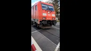 🚆 E-Lok BR 185 336-2 der DB f&auml;hrt mit einem G&uuml;terzug am B&uuml; Timmaspe in Richtung S&uuml;den
