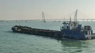 Hopper barge moving to dumping ground area