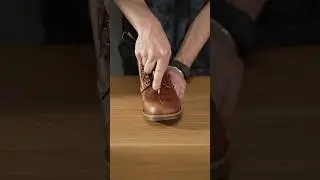 Cutting a pair of fake Red Wing Iron Rangers in half