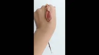 Handmade wire pendant with red jasper