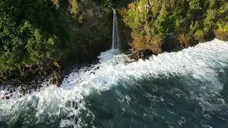 Hawaii Big Island waterfall into ocean