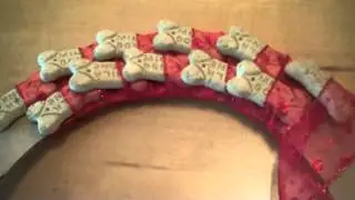 Instructions to make a dog cookie wreath for Christmas.