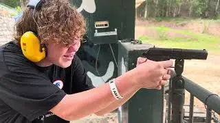 Kingston shooting a pistol