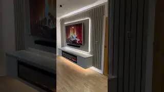 Background wall with fireplace.#tvwall #sinteredstone #wallpanel
