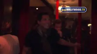Joe Francis talks with the paparazzi at Mercato di Vetro