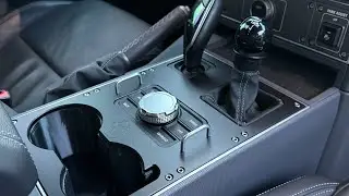 @grenadierusa machined aluminum center console panel and larger cup holders for Ineos Grenadier