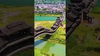 亚洲第一风雨廊桥，横卧在阿蓬江上的巨龙，纯木制结构，全长658米，亲临现场更觉震撼，致敬建设者们！  #shorts