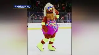 Gritty dresses up as a Barbie for Halloween