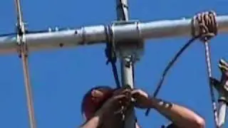 FieldComm TV - close up of KD4GIE working on the antenna