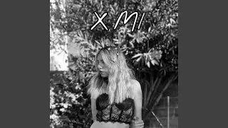 X Mi