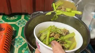 My mom cooked Morning Glory with beef. It's yummy for dinner.