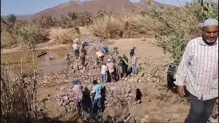 اشغال إعادة بناء قنطرة تملالت  إقليم زاكورة. تعليق: الأستاذ البشير السكوري