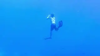 Our boatman doing a spot of FreeDiving