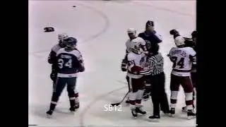 Gerard Gallant punches (not much) Doug Smail Nov. 25/1987