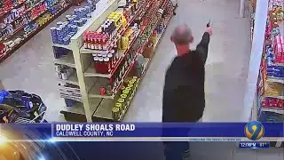 WATCH: Video captures clerk open fire on masked gunmen inside store