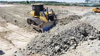Skill Operator SHANTUI DH17c2 Bulldozer Spreading Soil And 12 Wheel Dump Truck Unloading