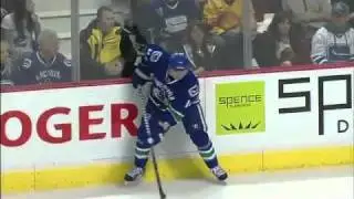 Alex Burrows Sends Clutterbuck Into Vancouver Bench