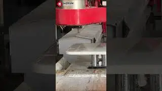 5+2 axis bridge saw uses a milling cutter and a shaping wheel to machine a stone dining table