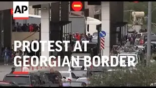 Protest at Georgian border as Russians arrive