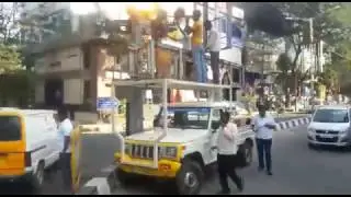 Baandhava Team Controlling Traffic while BESCOM officials work on Street Light Repairs