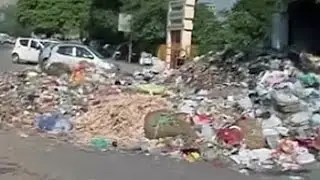 Garbage piles up in Delhi as sanitation workers continue strike; Chief Minister calls meeting
