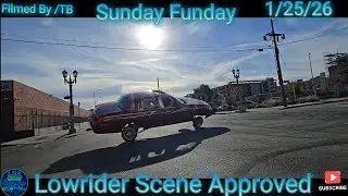 A Lincoln town car doing three wheels. Slow  Cruising down the street. He Comfortable up in there!🤣