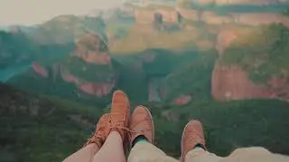 Couples Feet Dangling at Mountains Edge - Free Cinematic Stock Video Footage No Copyright