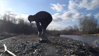 Emptying water from my waders after having to swim