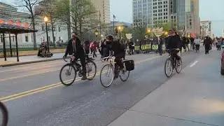 Protesters march to Columbus police headquarters for a second night